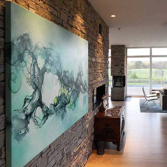 Painting on stone wall in living room